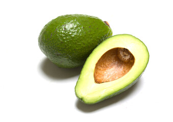 two halves of avocado on white background