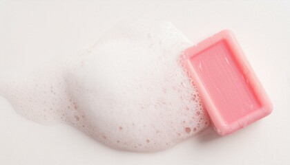 Fototapeta premium Piece of soap and foam on white background