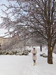 Woman walking outdoor in winter storm. Lexington, Kentucky.