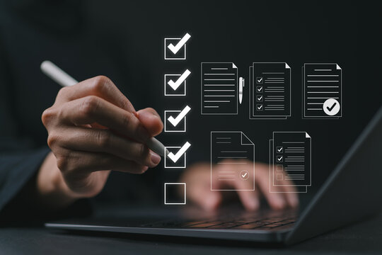 Digital form checklist, Online survey concept. Women interacts with digital form checklist on laptop with process of filling out online survey and completing digital forms with checkbox and document.