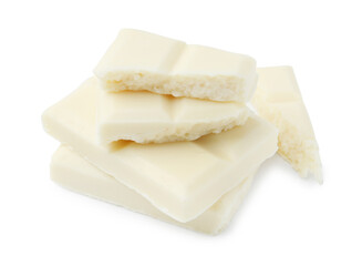 Pieces of delicious white chocolate isolated on white