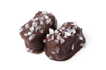 Tasty chocolate candies with salt isolated on white