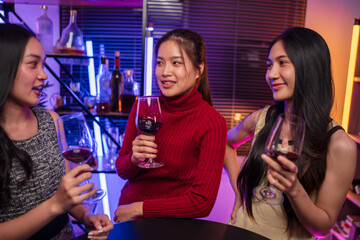 Party Celebrate whiskey at a friendly party in a restaurant. Night.