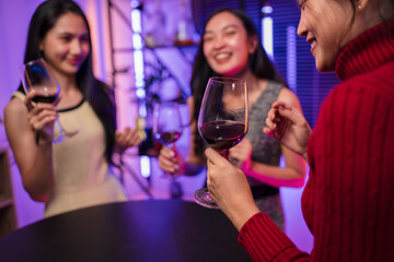 Party Celebrate whiskey at a friendly party in a restaurant. Night.