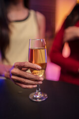 Party Celebrate whiskey at a friendly party in a restaurant. Night.