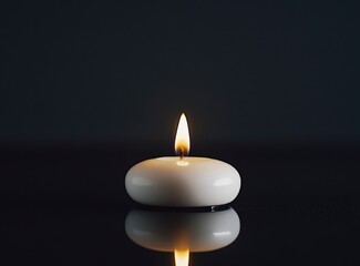 A white candle burning on a black background with copy space for text. The flame of the white, lit wax candle glows in soft light. Close-up view, isolated on a dark background, detailed illustration, 