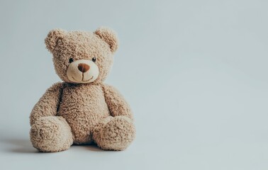 Obraz premium Cute brown teddy bear isolated on a white background with copy space, suitable for banner design. Stock photo, high quality.