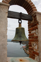 Bell at Castillo del Morro or San Pedro de la Roca fortress XVII century fortress and the entrance...