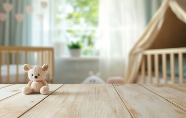 Empty wooden table top with blurred baby room interior background for product display, mock-up, and advertising concept. Stock photo with 2/3 space for text.