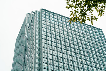 Architecture and real estate, residential apartment building with large panoramic windows, modern complex, angle view.