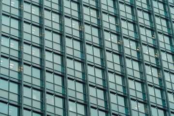 Obraz premium Architecture and real estate, residential apartment building with large panoramic windows, modern complex, angle view.