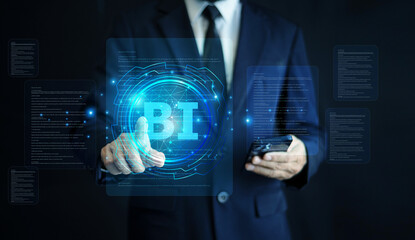 Businessman utilizes Business Intelligence for Data Management, Data Visualization, and Data Analysis to make strategic business decisions.