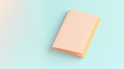 A minimalist pastel notebook resting on a soft blue background, creating a calm and creative aesthetic.