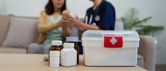 Caregiver assesses elderly patient symptoms in medical checkup home environment compassionate viewpoint