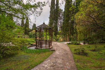 View of the Japanese garden with a wooden gazebo in the Upper Park of the Sochi Arboretum, Sochi, Krasnodar Territory, Russia