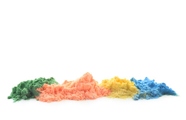 Heaps of color powder pigments on white background