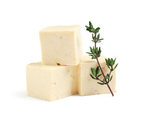 Pieces of delicious tofu cheese isolated on white background