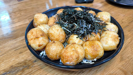 Takoyaki japanese snack with octopus inside.popular street food.