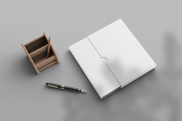 Blank hardcover book mockup with wooden pencil box