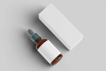 Blank dropper and box mockup laying down on the floor