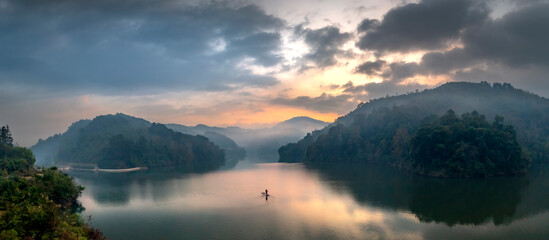 Fototapeta premium Sunrise on Ban Viet Lake in Cao Bang Province, Vietnam