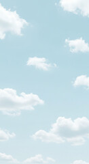 Serene Pastel Blue Sky with Fluffy White Clouds Background Image