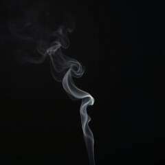 Obraz premium Thin lines of smoke rising against a pitch-black background