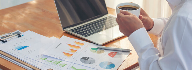 Banner Asian Businessman type keyboard write financial graph chart Planning marketing data. Banner Man hands using laptop at office desk reading spreadsheet excel finance document with copy space