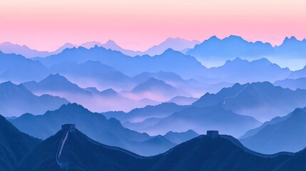 Panoramic view of the Great Wall of China winding through misty blue mountains at sunrise.