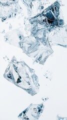 Close-up of ice cubes suspended in air, showcasing clarity and freshness on a white backdrop.