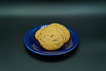 Freshly Baked Cookies with Chocolate Chips on Elegant Dish