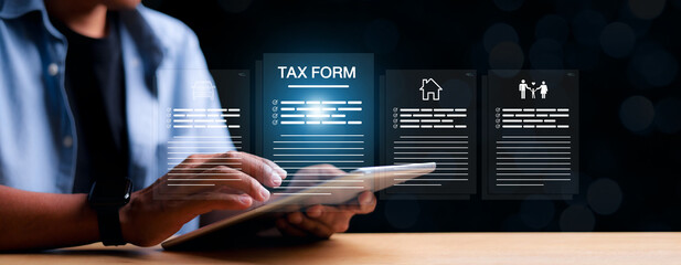 TAX REFUND and refund tax of duty taxation business, graphs and chart being demonstrated on the screen media, tablet pc and selecting tax refund, Saving tax for business