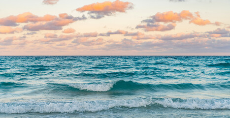 Obraz premium Sea horizon view. Cloudy sky and seascape at summer vacation. Skyscape with sea horizon. Calm horizon view at sea sunrise. Romantic summer vacation sunrise on seascape. Distant sea horizon