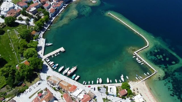 Aerial top-down view of the port of Thassos Limenas in the Mediterranean Sea, Greece