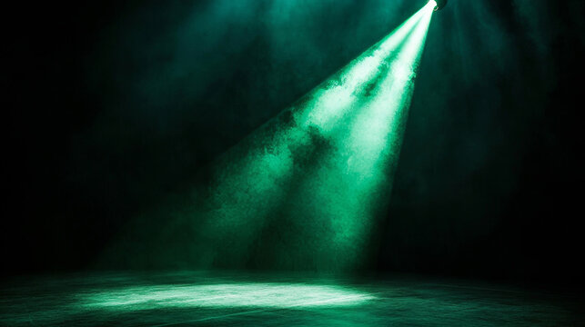 beautiful, A spotlight shines on the dark stage, with green light shining down from above. The beam of light is very strong and bright. There's nothing in front of it. A dark background.