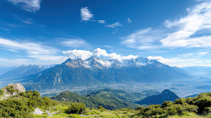 Breathtaking view of Alps with lush greenery and clear blue skies