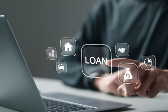 Online personal loan and financial concept. Person using laptop with loan icon. Financial loan agreement, Personal or business loans through online services between lenders and borrowers.
