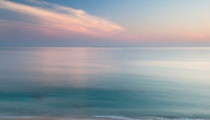 Obraz premium Serene Ocean at Sunset with Soft Pastel Colors