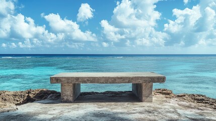 Coral Concrete Bench Overlooking Blue Sky and Seascape with Clear Waters and Minimal Landscape Elements