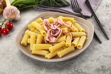 Italian cuisine - pasta tortiglioni with squid