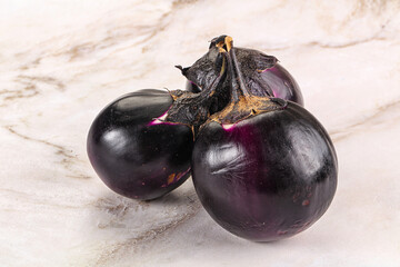 Raw violet and black eggplant