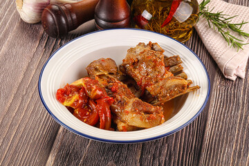 Baked lamb ribs with vegetables