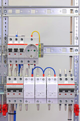 An electrical panel for the organization of electricity supply to the apartment. Close-up. Soft focus.
