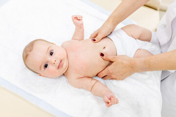 the child is given a massage by a pediatrician, a doctor's examination