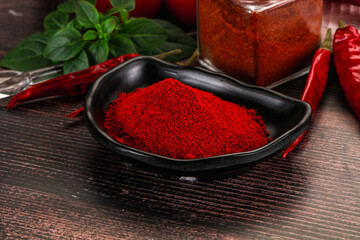Spicy dry paprika powder in the bowl