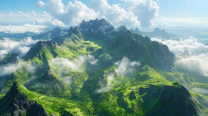 Aerial view of lush green mountains surrounded by clouds under a bright blue sky.