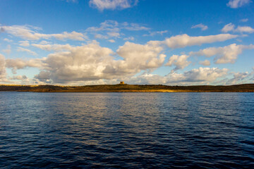 Ocean Landscape with Clouds and Horizon Under Evening Sky