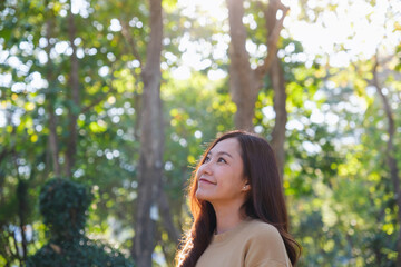 Portrait image of a woman in the park