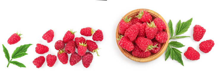 blackberry with leaf in wooden bowl and spoon isolated on a white background closeup