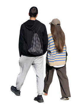 Back view of a young couple walking together outdoors. Man wears a black hoodie, gray sweatpants, drawstring backpack. Woman wears a striped sweater, brown pants. For 3d renderings, cgi, archviz
